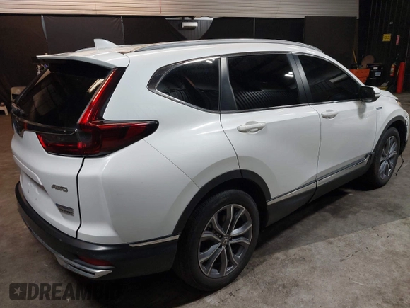 2021 Honda CR-V Touring with VIN 7FART6H98ME024238, listed as a IAAI auction lot 42341911 with 50,757 mi miles and . Bid and sale history available at DreamBid. Image 4.