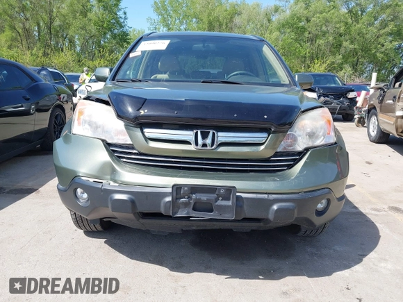 2007 Honda CR-V EX-L z VIN JHLRE387X7C073092, wystawiony jako IAAI lot #42090276 z przebiegiem 150 297 mil mil oraz . Historia ofert i sprzedaży dostępna na DreamBid. Obrazek 6.
