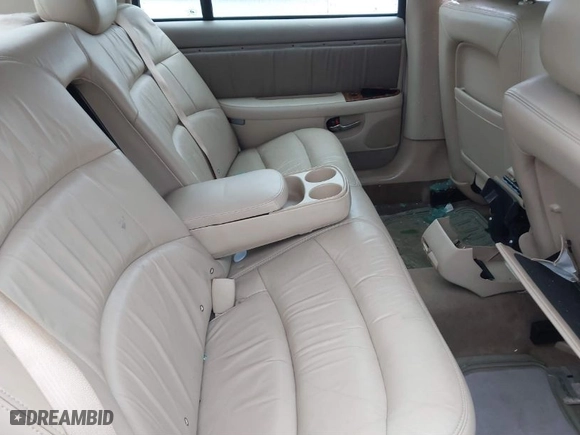 2004 Buick Park Avenue Ultra with VIN 1G4CU541544134529, listed as a IAAI auction lot 41604400 with 999999 miles. Bid and sale history available at carsss.com. Image 8.