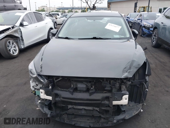 2014 Mazda 3 S Touring with VIN JM1BM1L35E1208952, listed as a IAAI auction lot 42121077 with 183,985 mi miles and . Bid and sale history available at carsss.com. Image 13.