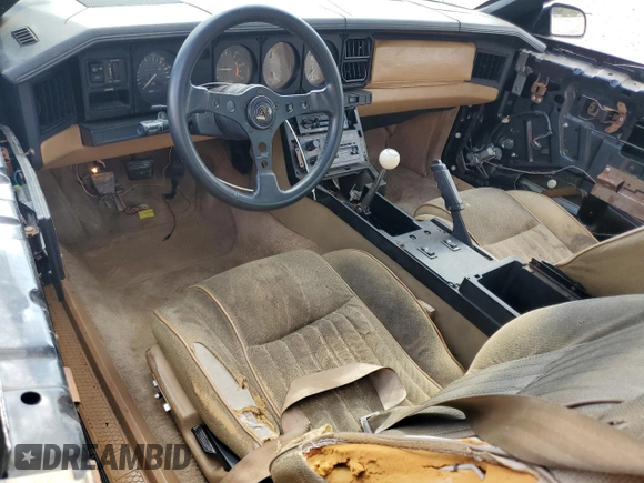 1982 Pontiac Firebird z VIN 1G2AX87H9CL548192, wystawiony jako Copart lot #79887554 z przebiegiem 109 953 mil mil oraz Czysty tytuł • Clean title. Historia ofert i sprzedaży dostępna na DreamBid. Obrazek 8.