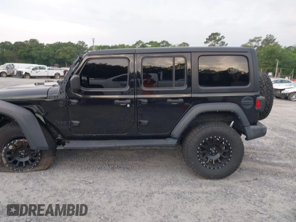2021 Jeep Wrangler Unlimited Willys z VIN 1C4HJXDM5MW859724, wystawiony jako IAAI lot #42311203 z przebiegiem 71 887 mil mil oraz . Historia ofert i sprzedaży dostępna na DreamBid. Obrazek 14.