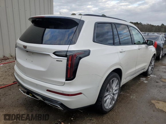 2021 Cadillac XT6 AWD Sport z VIN 1GYKPHRS4MZ209583, wystawiony jako Copart lot #66305562 z przebiegiem 19 570 mil mil oraz . Historia ofert i sprzedaży dostępna na DreamBid. Obrazek 4.