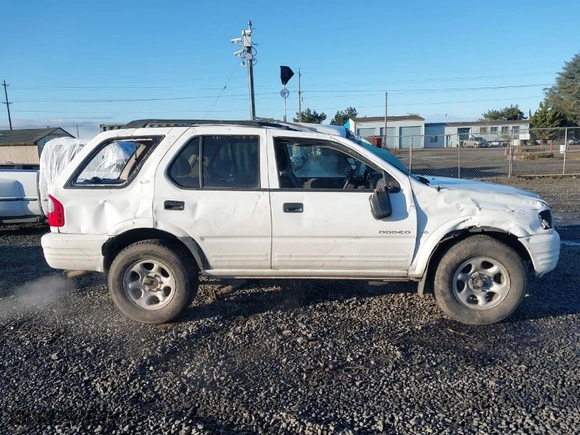 2001 Isuzu Rodeo S with VIN 4S2DM58W014335513, listed as a IAAI auction lot 41529329 with NaN miles. Bid and sale history available at carsss.com. Image 14.