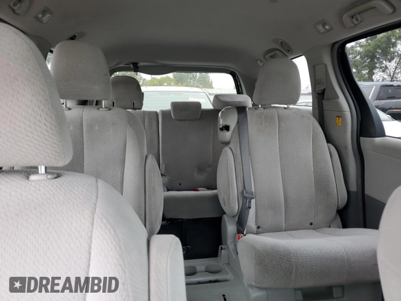 2012 Toyota Sienna with VIN 5TDKA3DC4CS014867, listed as a Copart auction lot 43191655 with 169,517 mi miles and Salvage Title. Bid and sale history available at DreamBid. Image 10.