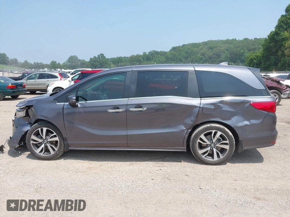 2022 Honda Odyssey Touring z VIN 5FNRL6H83NB023583, wystawiony jako IAAI lot #42425498 z przebiegiem Nie podano mil oraz . Historia ofert i sprzedaży dostępna na DreamBid. Obrazek 13.