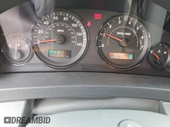 2005 Jeep Grand Cherokee Laredo with VIN 1J4GR48K55C719634, listed as a Copart auction lot 61809195 with 141,316 mi miles and Salvage title. Bid and sale history available at DreamBid. Image 9.