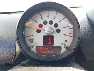 2014 MINI Countryman S z VIN WMWZC3C57EWP51864, wystawiony jako IAAI lot #42556774 z przebiegiem 73 912 mil mil oraz . Historia ofert i sprzedaży dostępna na DreamBid. Obrazek 7.