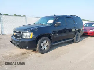 2014 Chevrolet Tahoe LT with VIN 1GNSCBE01ER235571, listed as a IAAI auction lot 42403118 with 238,069 mi miles and . Bid and sale history available at DreamBid. Image 2.