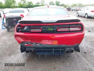 2016 Dodge Challenger R/T Plus z VIN 2C3CDZBT7GH300254, wystawiony jako IAAI lot #42289267 z przebiegiem 103 491 mil mil oraz . Historia ofert i sprzedaży dostępna na DreamBid. Obrazek 6.