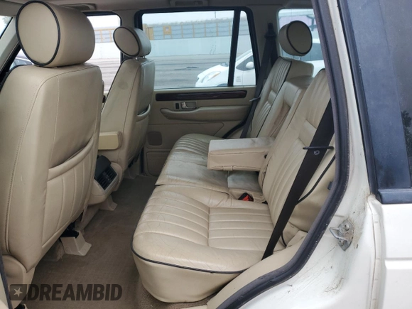 2000 Land Rover Range Rover z VIN SALPV1645YA445526, wystawiony jako Copart lot #59591285 z przebiegiem 158 729 mil mil oraz Szkoda całkowita • Salvage title. Historia ofert i sprzedaży dostępna na DreamBid. Obrazek 11.