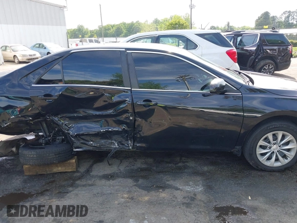 2017 Toyota Camry XLE z VIN 4T1BF1FK0HU403059, wystawiony jako IAAI lot #42112842 z przebiegiem 99 782 mil mil oraz . Historia ofert i sprzedaży dostępna na DreamBid. Obrazek 13.