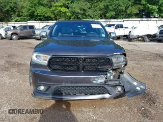 2015 Dodge Durango SXT with VIN 1C4RDHAG0FC771247, listed as a IAAI auction lot 42463389 with 171,668 mi miles and . Bid and sale history available at DreamBid. Image 13.