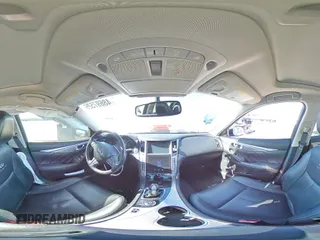 2014 Infiniti Q50 Hybrid Premium with VIN JN1AV7AP1EM692234, listed as a Copart auction lot 48697525 with 104,586 mi miles and Salvage Title. Bid and sale history available at DreamBid. Image 12.