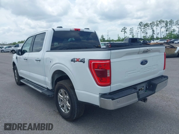 2022 Ford F-150 XL with VIN 1FTFW1E52NFB50568, listed as a IAAI auction lot 42061972 with 65,065 mi miles and . Bid and sale history available at DreamBid. Image 3.