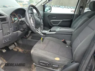2015 Nissan Titan SV with VIN 1N6AA0EC9FN500624, listed as a Copart auction lot 50982985 with 128,976 mi miles and Salvage title. Bid and sale history available at DreamBid. Image 7.