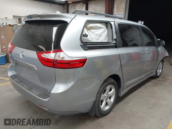 2018 Toyota Sienna LE Auto Access Seat with VIN 5TDKZ3DC3JS913564, listed as a IAAI auction lot 41657326 with 107,166 mi miles and . Bid and sale history available at DreamBid. Image 4.
