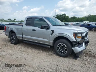2023 Ford F-150 XL with VIN 1FTEX1EP9PKE34381, listed as a Copart auction lot 63938505 with 13,933 mi miles and Salvage title. Bid and sale history available at DreamBid. Image 4.