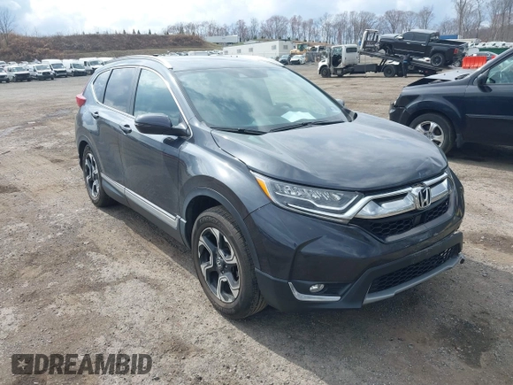 2019 Honda CR-V Touring with VIN 2HKRW2H9XKH636354, listed as a IAAI auction lot 41902615 with 66,781 mi miles and . Bid and sale history available at DreamBid. Image 1.