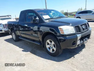 2006 Nissan Titan SE with VIN 1N6BA06B76N534667, listed as a IAAI auction lot 42143765 with 165,208 mi miles and . Bid and sale history available at DreamBid. Image 1.