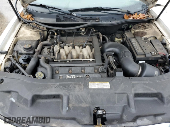 1999 Lincoln Continental with VIN 1LNHM97V3XY667567, listed as a Copart auction lot 84194854 with 137,163 mi miles and Salvage Title. Bid and sale history available at carsss.com. Image 11.