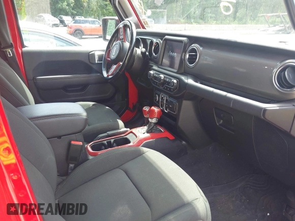 2021 Jeep Wrangler Unlimited Sahara z VIN 1C4HJXEGXMW631033, wystawiony jako IAAI lot #42550070 z przebiegiem 54 429 mil mil oraz . Historia ofert i sprzedaży dostępna na DreamBid. Obrazek 5.