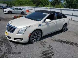 2014 Cadillac XTS z VIN 2G61L5S39E9258582, wystawiony jako Copart lot #59769315 z przebiegiem 132 590 mil mil oraz Szkoda całkowita • Salvage title. Historia ofert i sprzedaży dostępna na DreamBid. Obrazek 1.