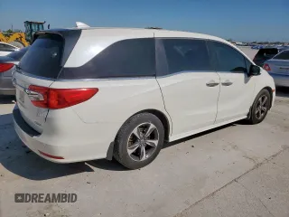 2018 Honda Odyssey Touring с VIN 5FNRL6H8XJB042111, выставлен на аукционе Copart как лот 52360005 с пробегом 126 835 миль миль и Чистый • Clean title. История ставок и продаж доступна на DreamBid. Изображение 3.
