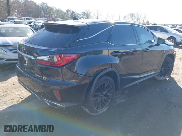 2016 Lexus RX 350 with VIN 2T2BZMCA2GC049142, listed as a IAAI auction lot 41453409 with 103,760 mi miles and . Bid and sale history available at DreamBid. Image 4.