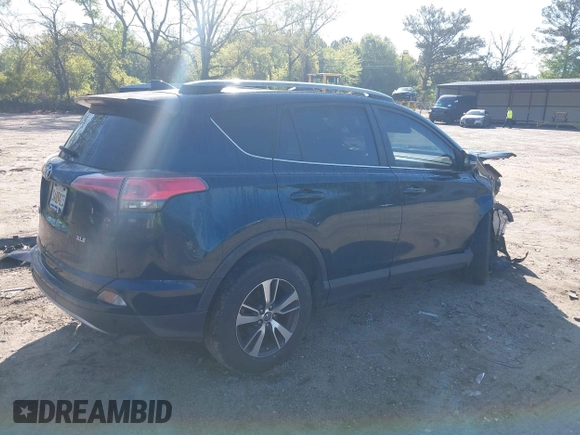 2018 Toyota RAV4 XLE with VIN JTMWFREV5JJ739619, listed as a IAAI auction lot 42017343 with 126,810 mi miles and . Bid and sale history available at DreamBid. Image 4.
