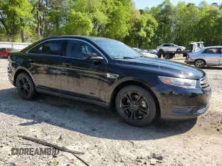 2014 Ford Taurus SEL with VIN 1FAHP2E84EG155311, listed as a Copart auction lot 51813125 with 156,611 mi miles and Salvage Title. Bid and sale history available at carsss.com. Image 4.