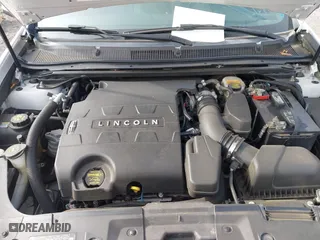 2013 Lincoln MKS with VIN 1LNHL9DK4DG611684, listed as a IAAI auction lot 42043879 with 132,866 mi miles. Bid and sale history available at carsss.com. Image 10.