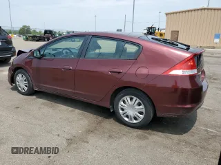 2011 Honda Insight with VIN JHMZE2H31BS008097, listed as a Copart auction lot 60780625 with 111,688 mi miles and Salvage title. Bid and sale history available at DreamBid. Image 2.
