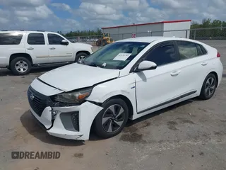 2018 Hyundai Ioniq SEL z VIN KMHC75LC2JU096795, wystawiony jako IAAI lot #42120793 z przebiegiem 111 058 mil mil oraz . Historia ofert i sprzedaży dostępna na DreamBid. Obrazek 2.