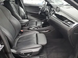 2018 BMW X2 sDrive28i with VIN WBXYJ3C34JEJ91176, listed as a Copart auction lot 63418365 with 62,586 mi miles and Salvage title. Bid and sale history available at DreamBid. Image 7.