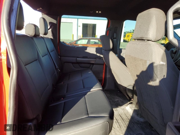 2023 Ford F-150 with VIN 1FTFW1P85PKD82406, listed as a Copart auction lot 84744944 with 32,982 mi miles and Salvage title. Bid and sale history available at DreamBid. Image 10.