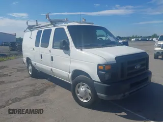 2010 Ford Econoline Cargo Commercial with VIN 1FTNE2EL5ADA74594, listed as a IAAI auction lot 42523529 with 129,648 mi miles and . Bid and sale history available at DreamBid. Image 1.