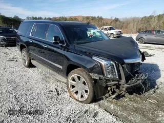 2015 Cadillac Escalade ESV Luxury z VIN 1GYS4SKJ5FR554888, wystawiony jako Copart lot #42372885 z przebiegiem 163 495 mil mil oraz Szkody całkowita. Historia ofert i sprzedaży dostępna na DreamBid. Obrazek 11.