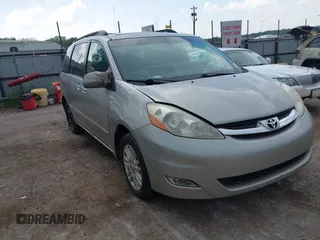 2007 Toyota Sienna XLE z VIN 5TDBK22C07S005499, wystawiony jako IAAI lot #42304686 z przebiegiem 179 721 mil mil oraz . Historia ofert i sprzedaży dostępna na DreamBid. Obrazek 1.