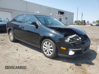 2010 Volkswagen Jetta S with VIN 3VWJX7AJ0AM010023, listed as a Copart auction lot 52379285 with 124,881 mi miles and Salvage title. Bid and sale history available at DreamBid. Image 4.
