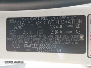 2008 Kia Spectra SX with VIN KNAFE121185508223, listed as a IAAI auction lot 42028372 with 152,526 mi miles. Bid and sale history available at carsss.com. Image 9.