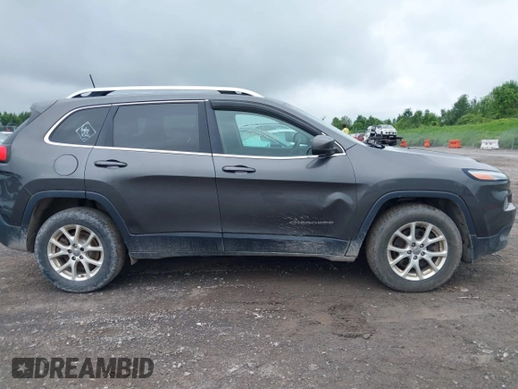 2016 Jeep Cherokee Latitude with VIN 1C4PJMCS3GW368342, listed as a IAAI auction lot 42693091 with 139,302 mi miles and . Bid and sale history available at DreamBid. Image 13.