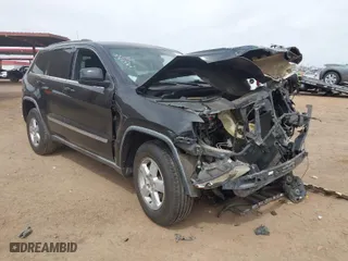 2011 Jeep Grand Cherokee Laredo with VIN 1J4RR4GGXBC506728, listed as a IAAI auction lot 41889334 with 236,099 mi miles. Bid and sale history available at carsss.com. Image 1.
