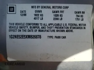 1999 Pontiac Grand Am SE2 with VIN 1G2NE52E5XM826878, listed as a Copart auction lot 77351164 with 241,463 mi miles and Salvage Title. Bid and sale history available at carsss.com. Image 12.