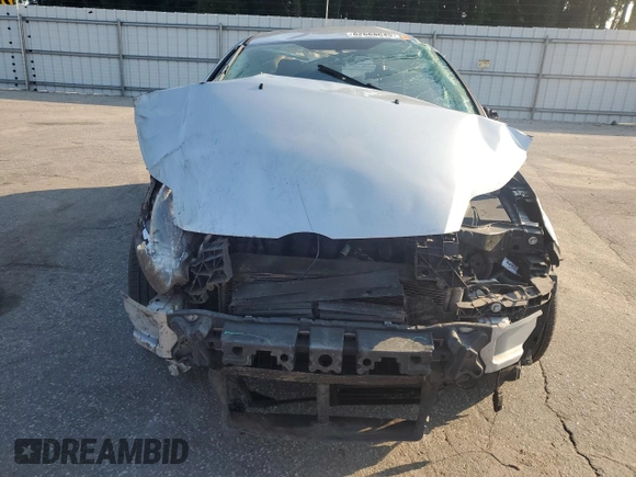 2012 Ford Focus SE with VIN 1FAHP3F20CL211460, listed as a Copart auction lot 62668645 with 151,334 mi miles and Salvage title. Bid and sale history available at DreamBid. Image 5.