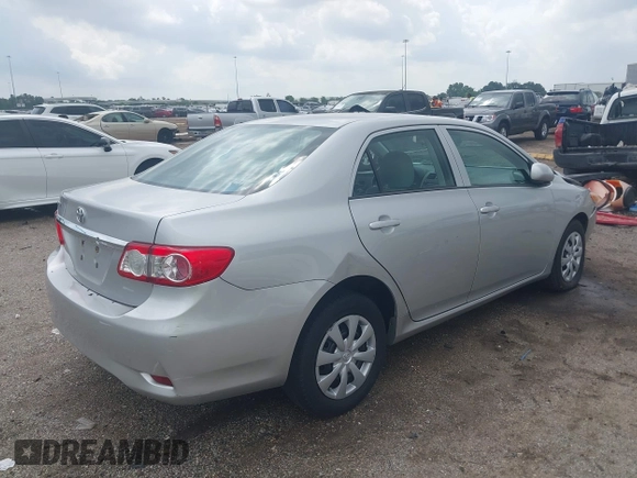 2013 Toyota Corolla L with VIN 5YFBU4EE8DP161765, listed as a IAAI auction lot 42109708 with 105,931 mi miles and . Bid and sale history available at DreamBid. Image 4.