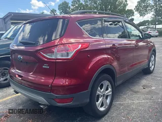 2014 Ford Escape SE with VIN 1FMCU9GXXEUB75330, listed as a Copart auction lot 62310025 with 119,858 mi miles and Clean title. Bid and sale history available at DreamBid. Image 4.