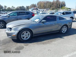 2014 Ford Mustang V6 with VIN 1ZVBP8AM9E5210284, listed as a IAAI auction lot 41957298 with 108,579 mi miles. Bid and sale history available at carsss.com. Image 14.