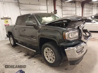 2018 GMC Sierra 1500 SLE z VIN 3GTU2MEC0JG263236, wystawiony jako IAAI lot #41434415 z przebiegiem 67 145 mil mil oraz . Historia ofert i sprzedaży dostępna na DreamBid. Obrazek 1.