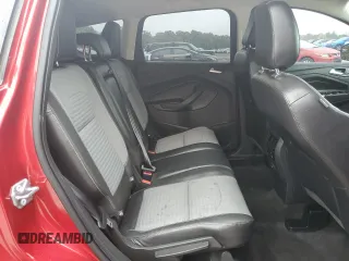 2018 Ford Escape SE z VIN 1FMCU9GD4JUA49819, wystawiony jako Copart lot #73023734 z przebiegiem 96 228 mil mil oraz Szkody całkowita. Historia ofert i sprzedaży dostępna na DreamBid. Obrazek 11.